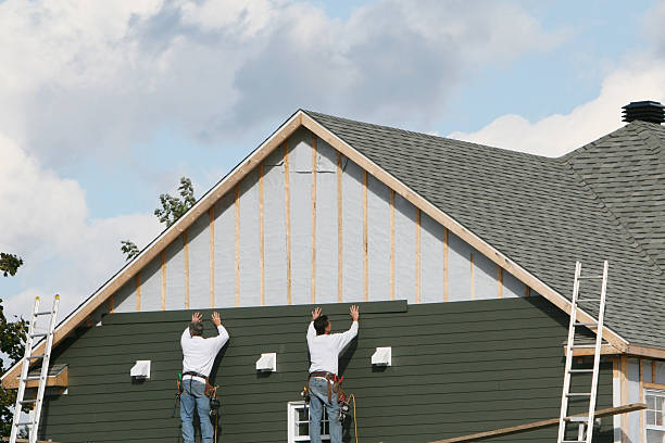 Professional Siding Installation technician working in Dover, TN